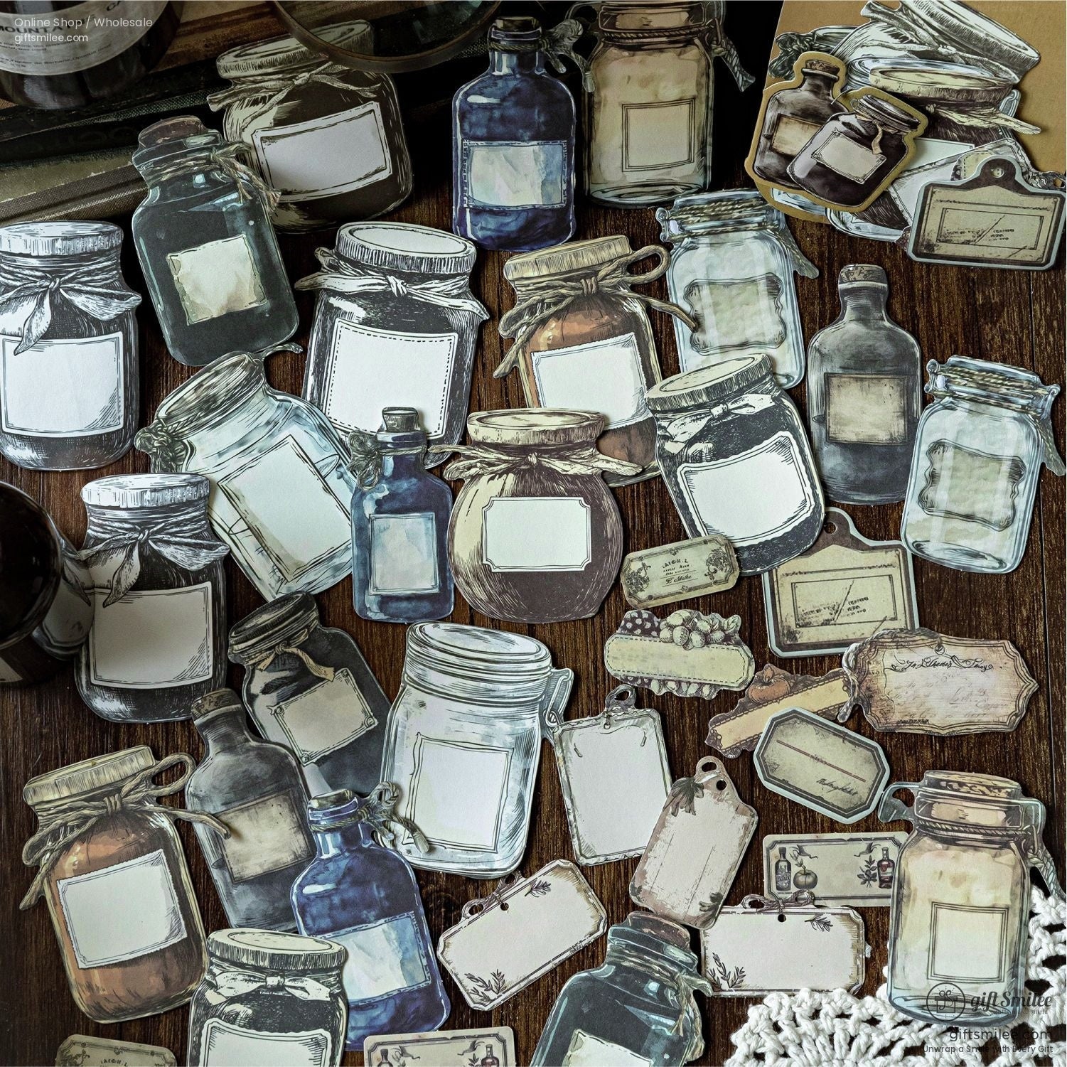 A spread of antique-inspired bottle stickers with tags, perfect for scrapbooking and journaling