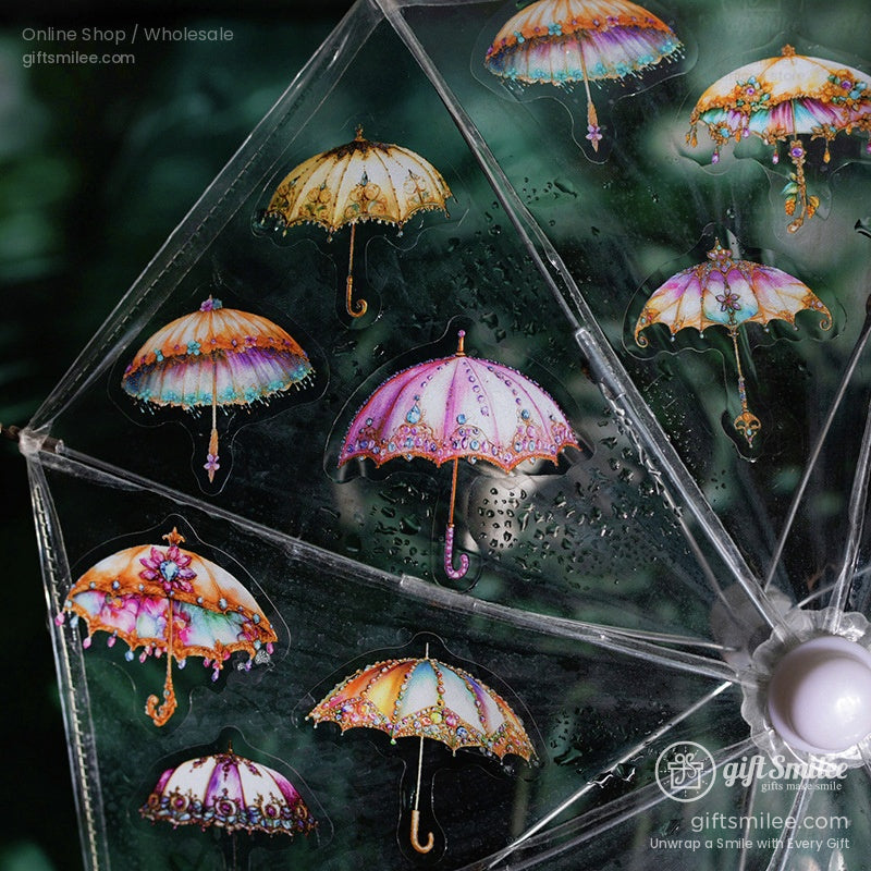 Transparent umbrella showcasing vintage and artistic umbrella sticker designs