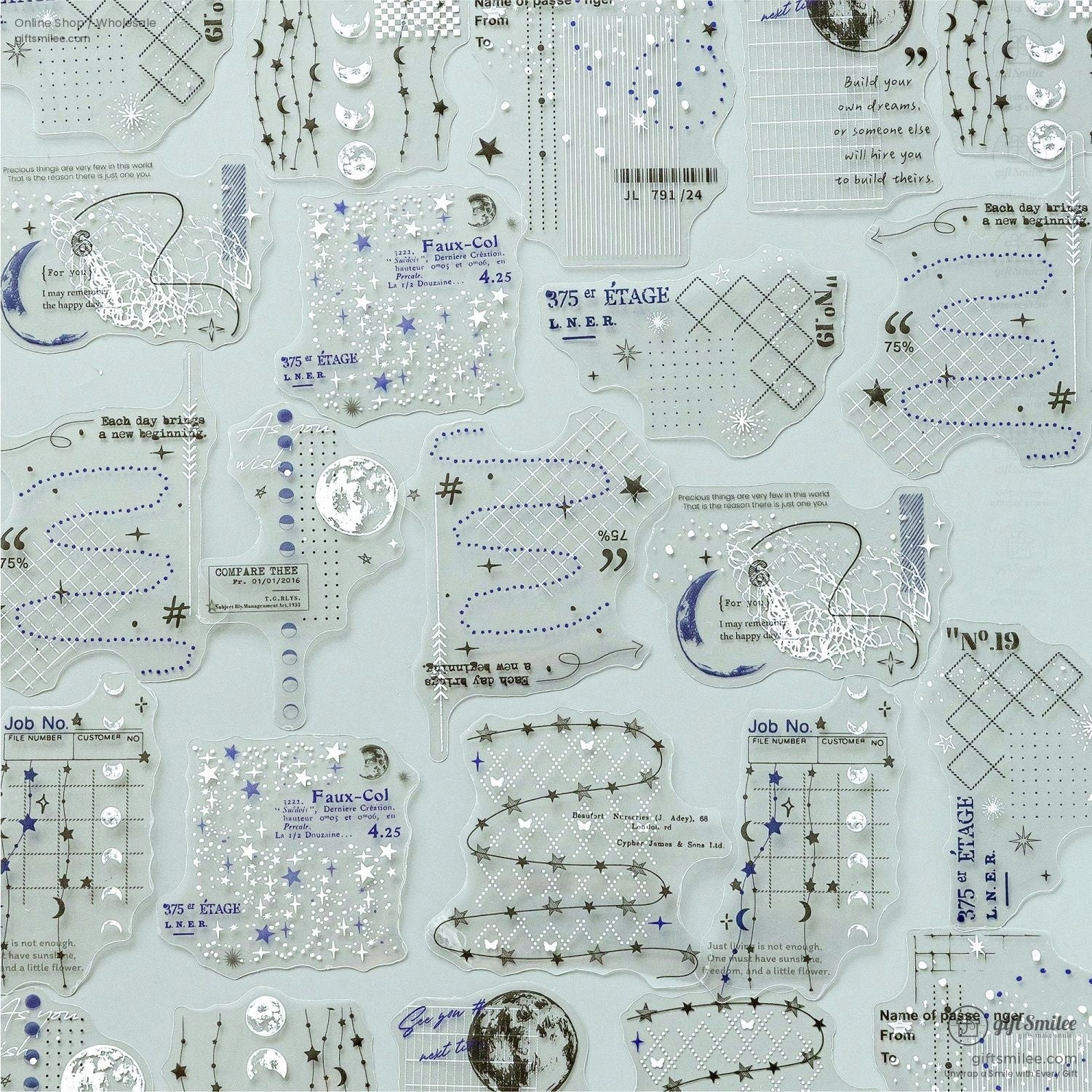 A flat lay of transparent celestial-themed stickers featuring stars, moons, and vintage text designs, perfect for scrapbooking or journaling