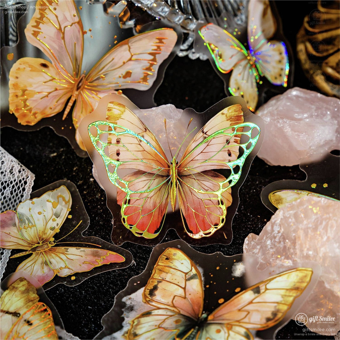 Holographic golden butterfly stickers with rose quartz and lace backdrop