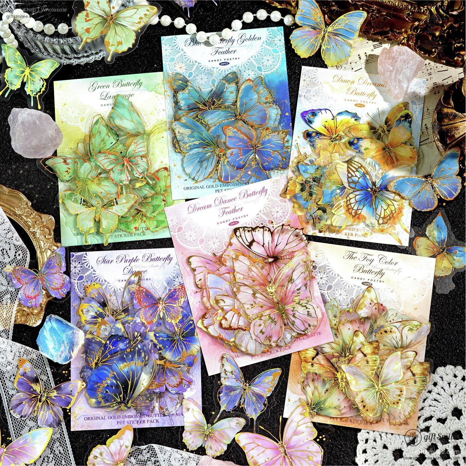 Assorted butterfly sticker packs with delicate gold embossing and artistic packaging