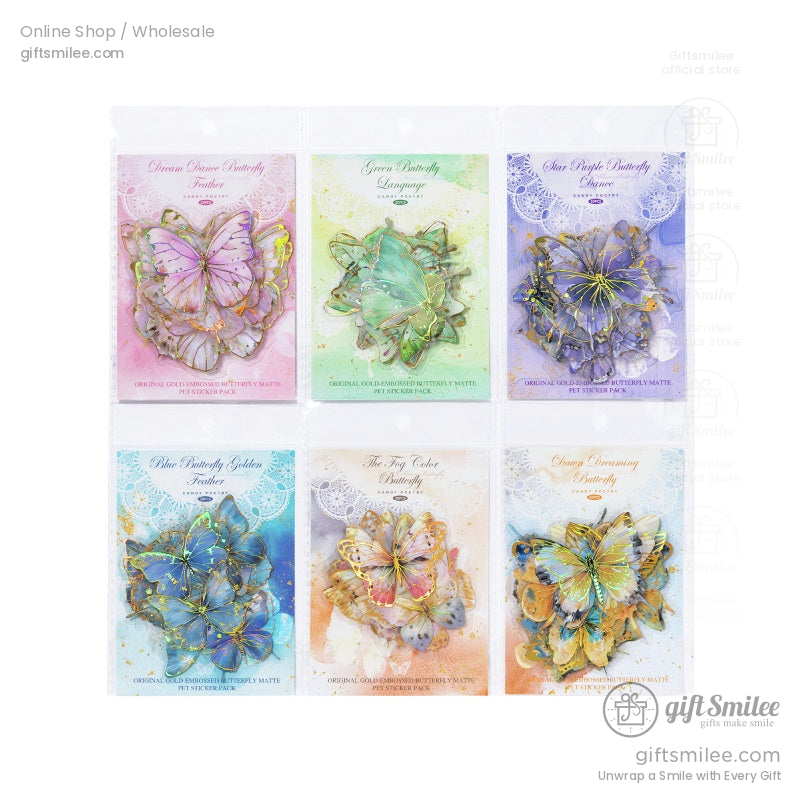 Close-up of six colorful butterfly sticker designs in their original packaging