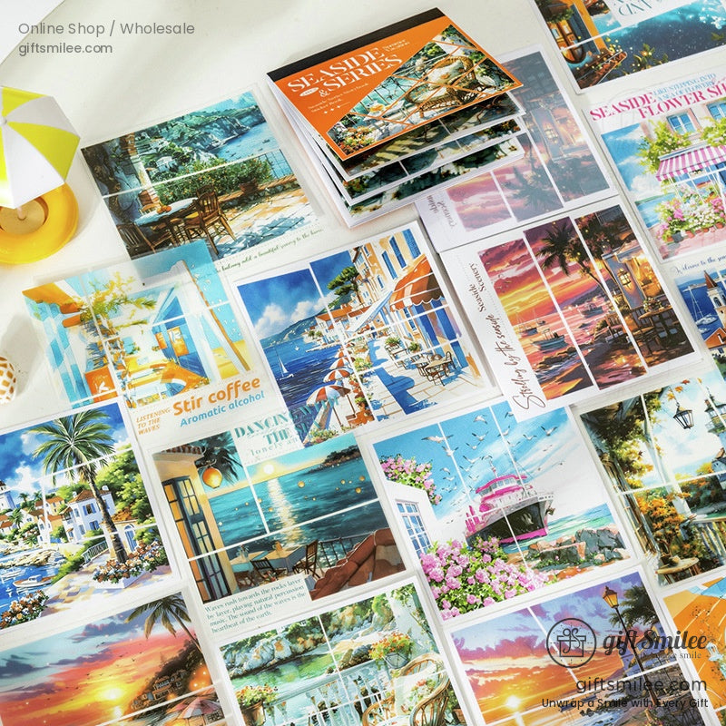 Coastal art sticker book displayed on a beach-themed table with vibrant seaside illustrations
