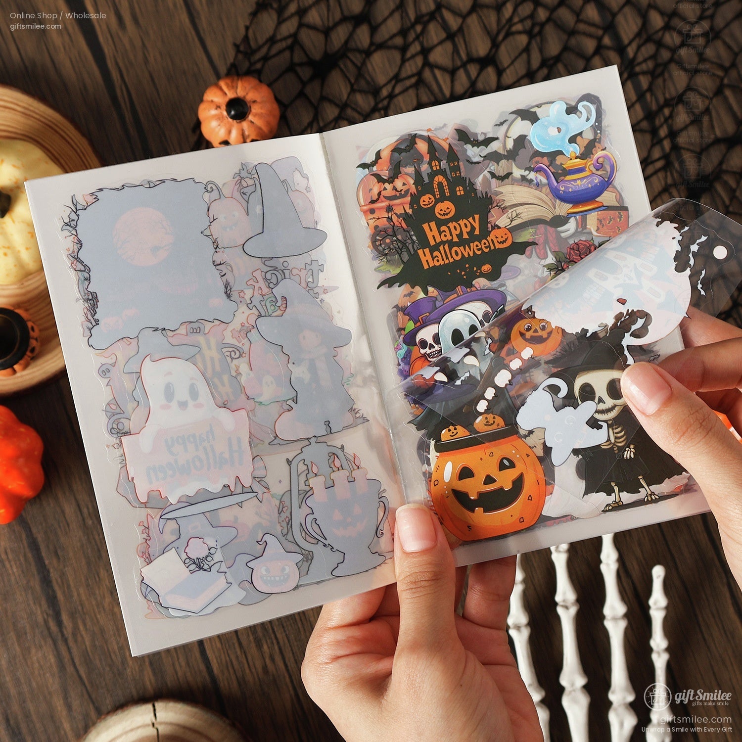 Close-up view of colorful Halloween stickers in a transparent booklet