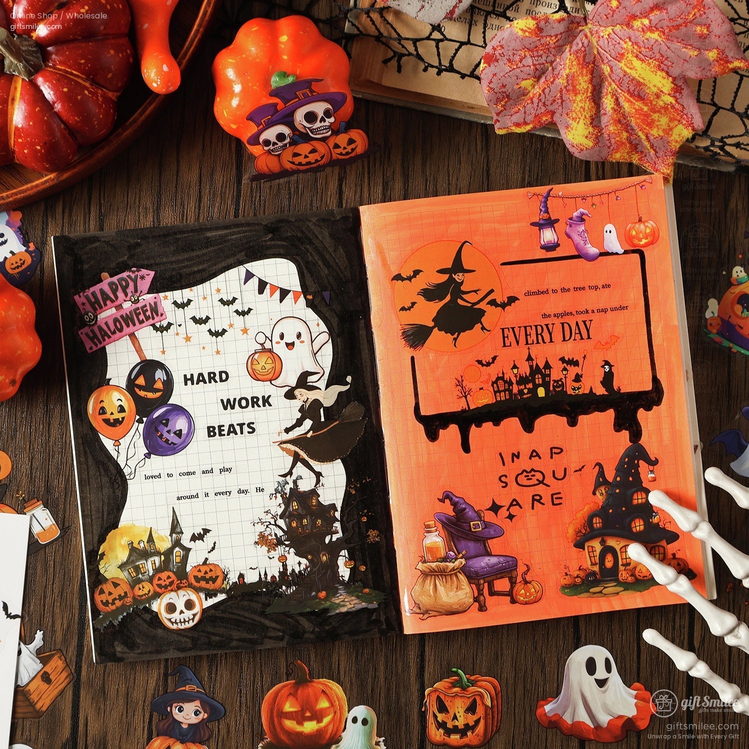 Halloween scrapbook with spooky stickers and pumpkin decor