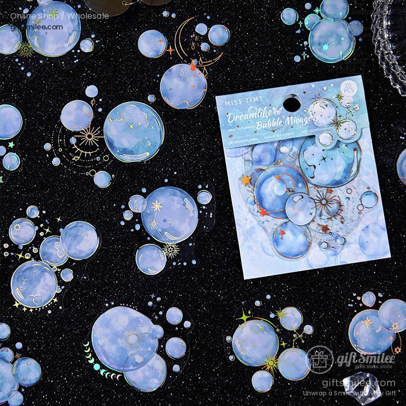 A set of Dreamlike Bubble Mirage stickers in pastel hues featuring bubble and butterfly designs, displayed on a glittery black surface
