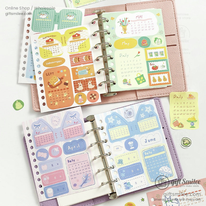 A set of pastel monthly planner stickers featuring various calendar designs and cute decorations displayed with an open planner