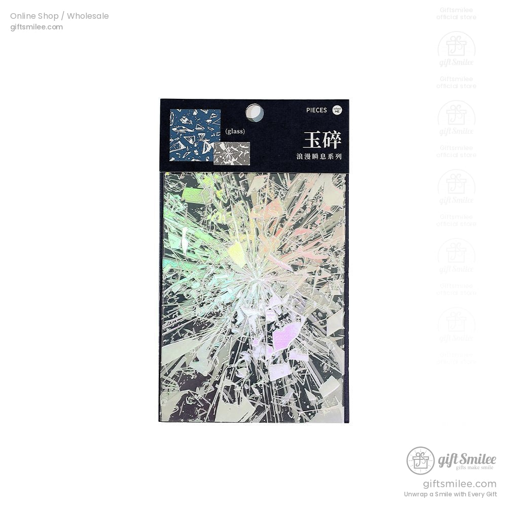 A creative journaling page decorated with holographic glass shard stickers, highlighting their shiny and intricate details