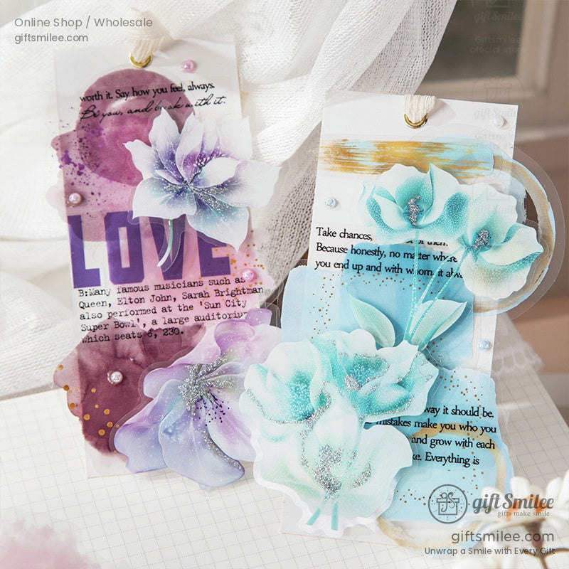 Handmade tags decorated with floral and watercolor galaxy stickers