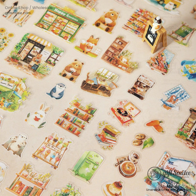 A collection of kawaii animal-themed stickers featuring cats, bunnies, and cozy shop scenes