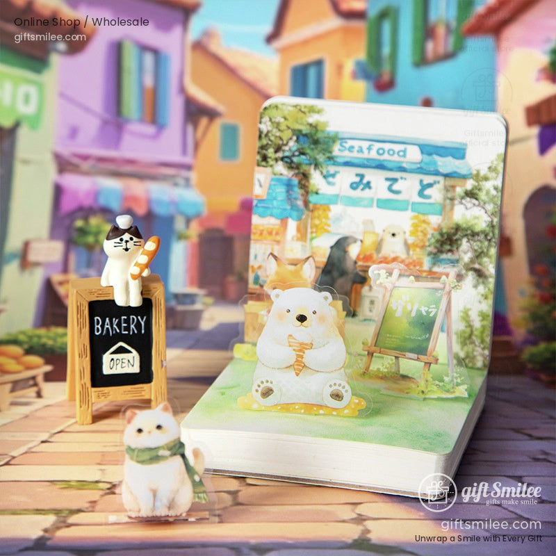A bakery-themed sticker with a cat holding a baguette and a polar bear enjoying a treat
