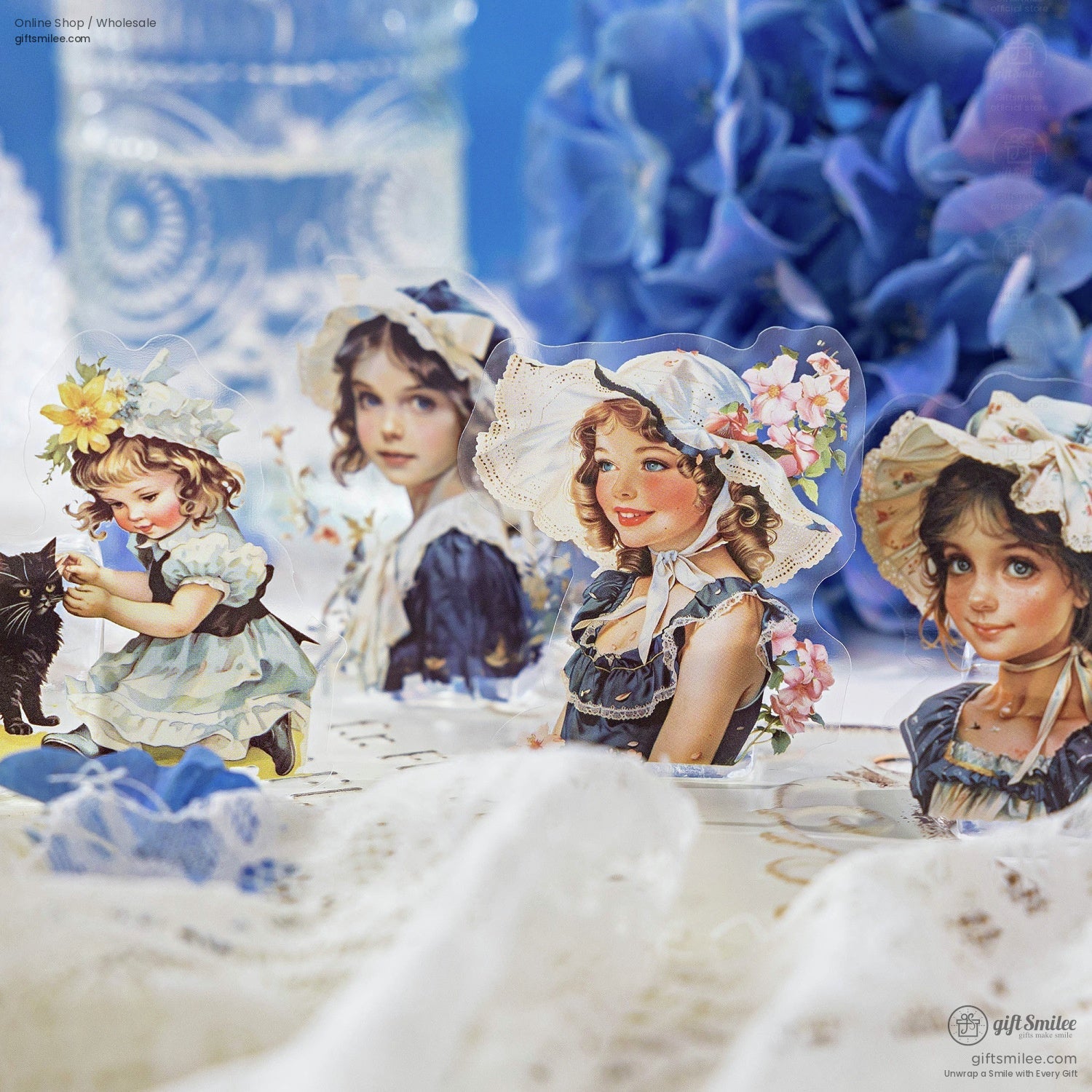 Vintage-style stickers of girls in bonnets with floral details, set against a blue and lace backdrop