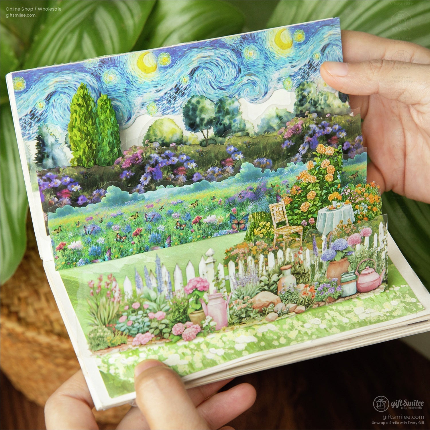 Colorful pop-up scrapbook page featuring a vibrant garden scene with flowers, greenery, and a Van Gogh-inspired starry night backdrop