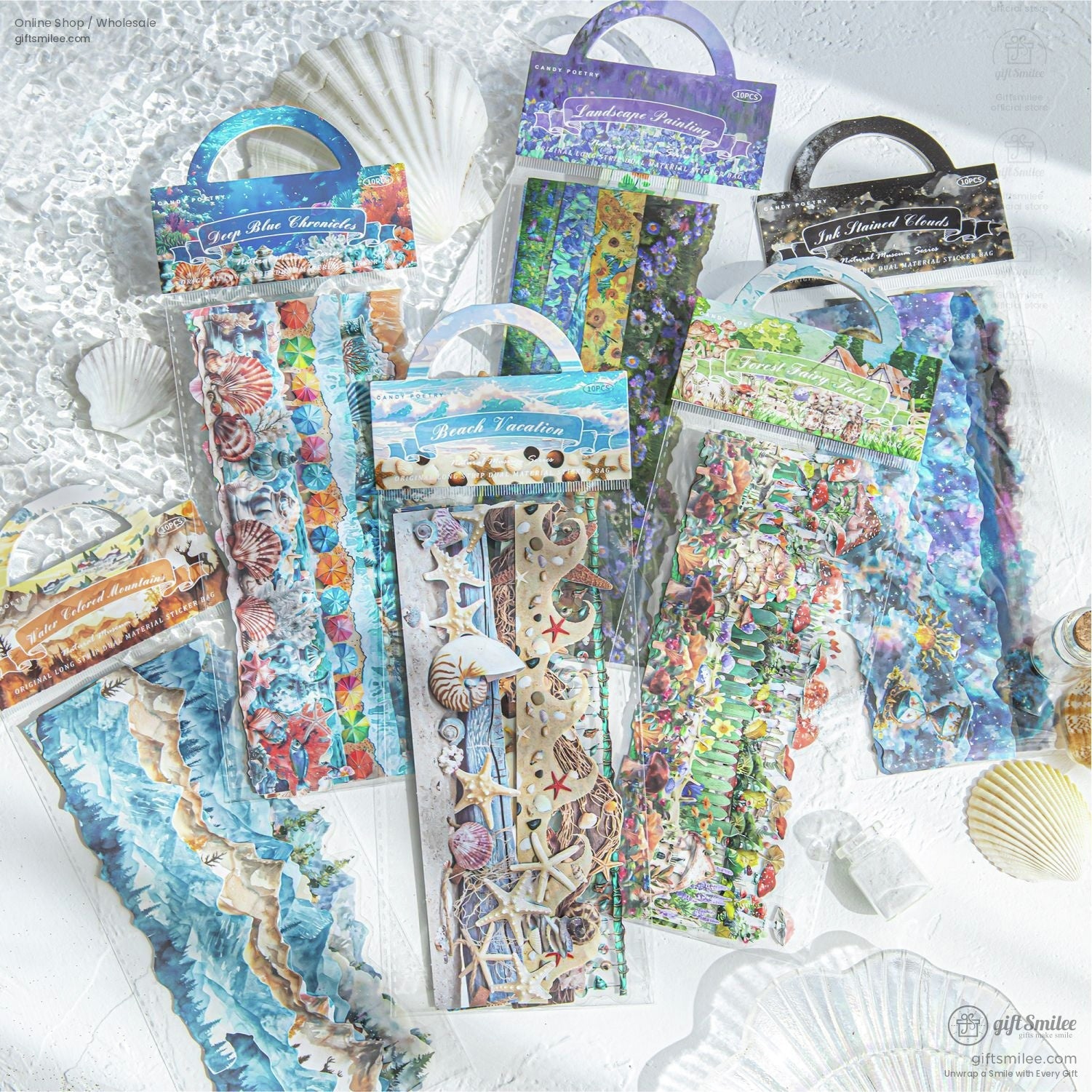 Assorted washi tape packs displayed on a beach-themed setup with seashells, showcasing various designs like ocean waves, floral gardens, and landscapes