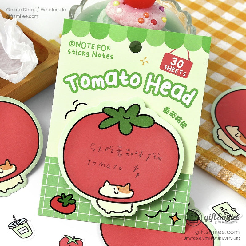 Tomato Head sticky note featuring a kawaii tomato-shaped design with playful props and a handwritten note