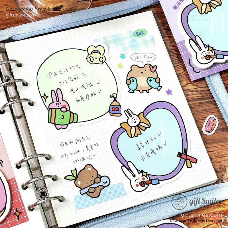 Open planner decorated with kawaii sticky notes - animal and food-themed designs with handwritten notes