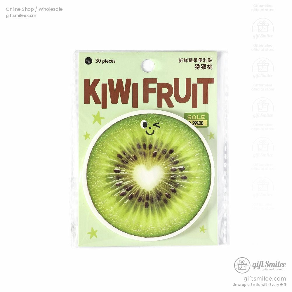 A collection of fruit-themed stickers, including pineapple, kiwi, tomato, and onion, on a desk with journaling supplies