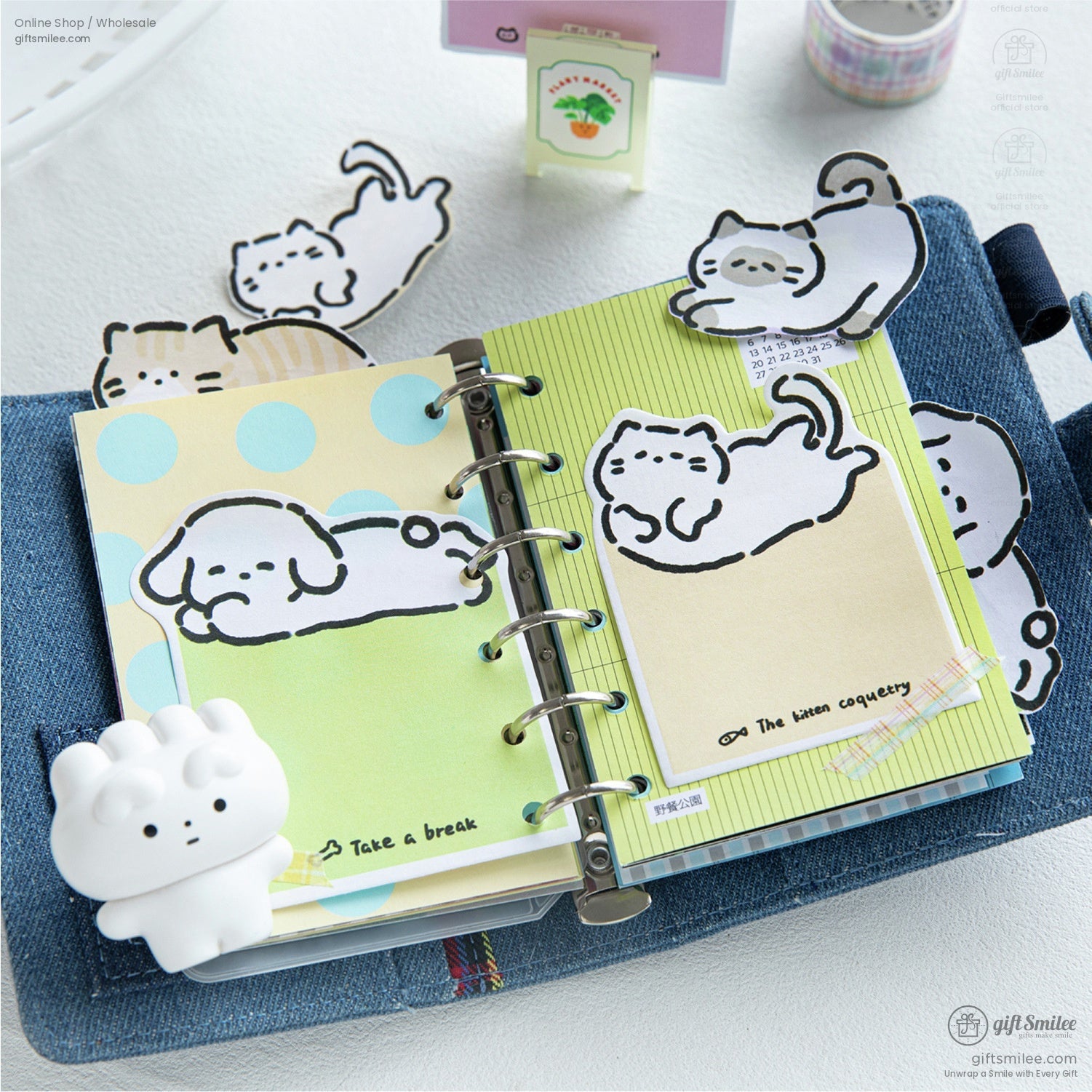 Planner with kitten and puppy-themed sticky notes, adding a touch of cuteness to your daily tasks