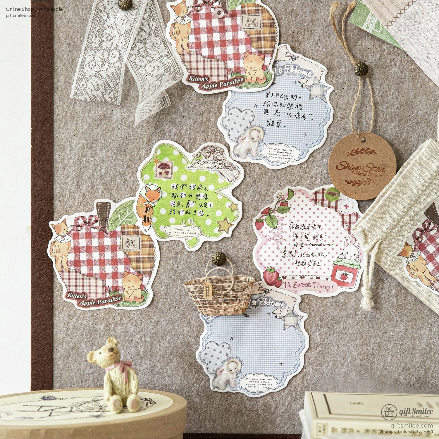 A bulletin board decorated with vintage-inspired stickers showcasing themes like Kittens Apple Paradise and Mushroom House