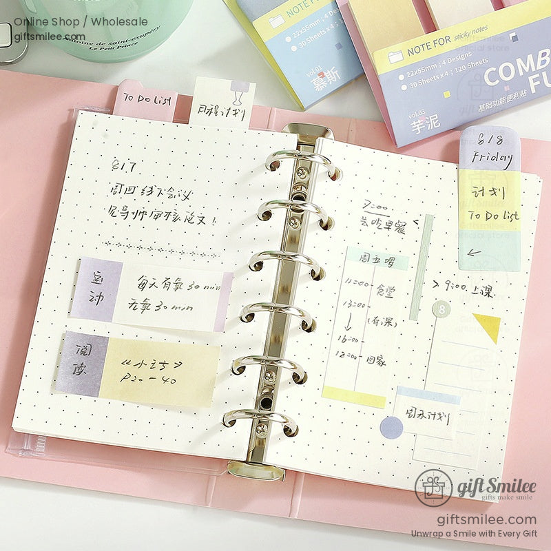 A vibrant set of pastel sticky notes for planners and journals, neatly arranged on a desk