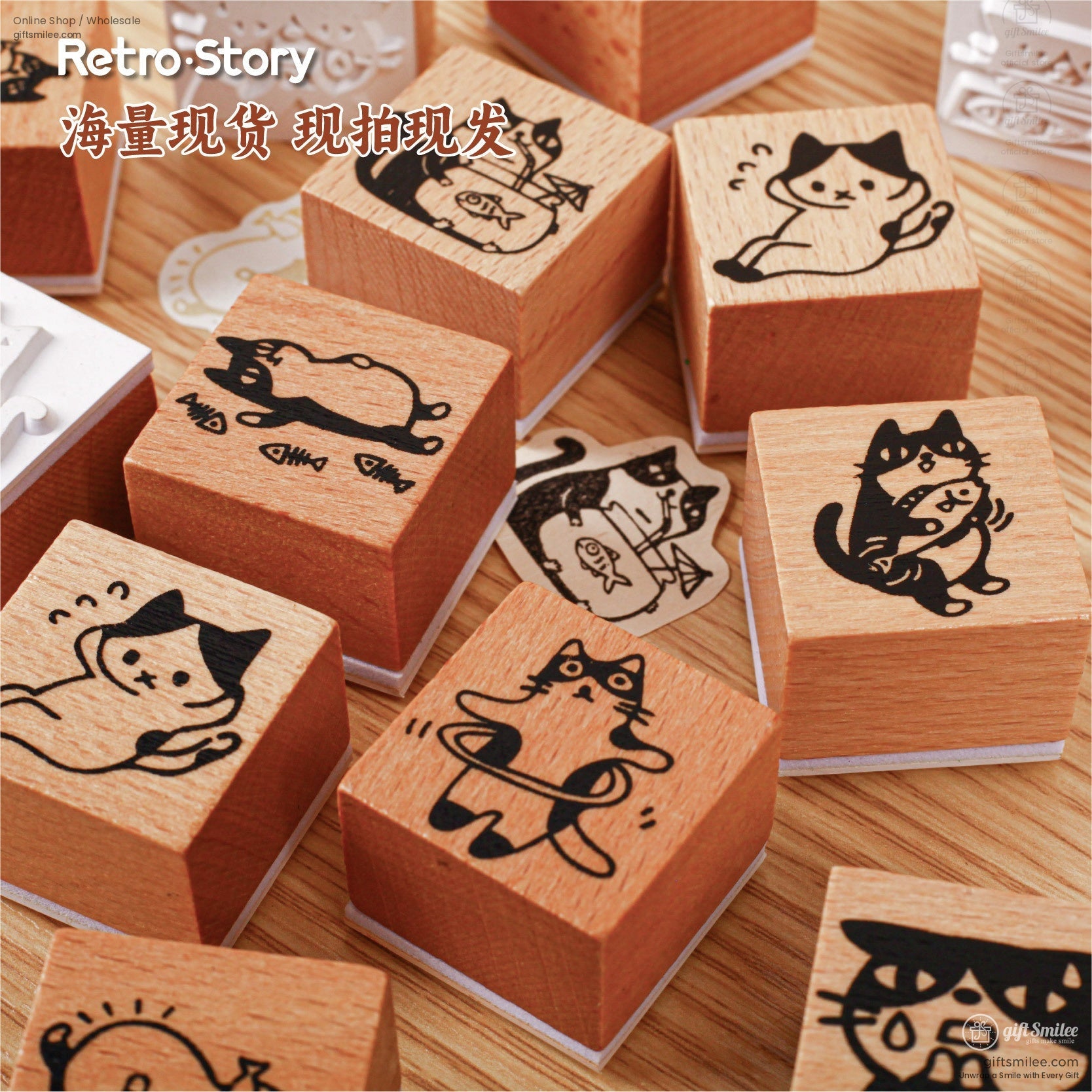 Multiple wooden cat rubber stamps displayed with various adorable feline poses and expressions