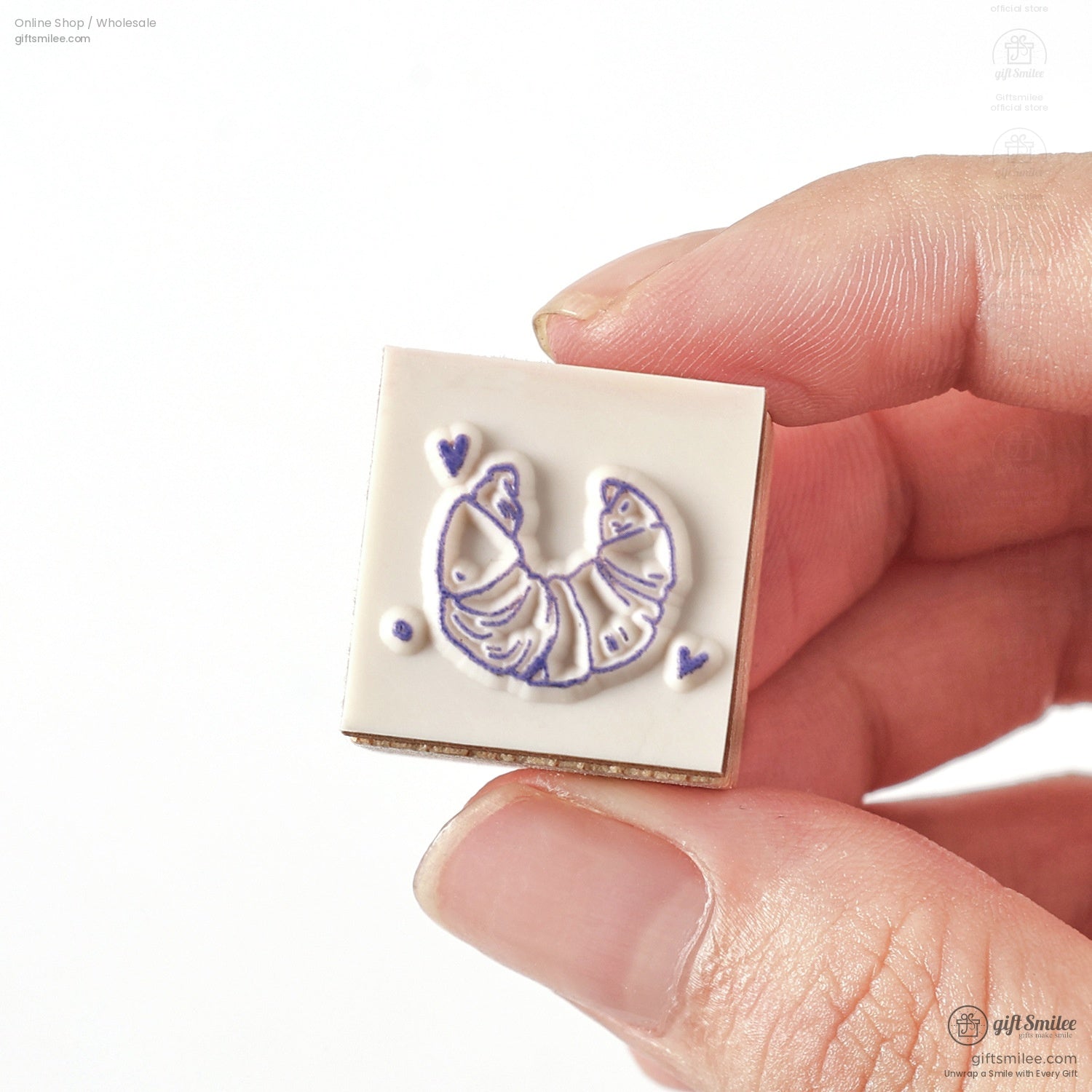 Single wooden stamp with a croissant design, showcasing intricate carving and vintage aesthetic